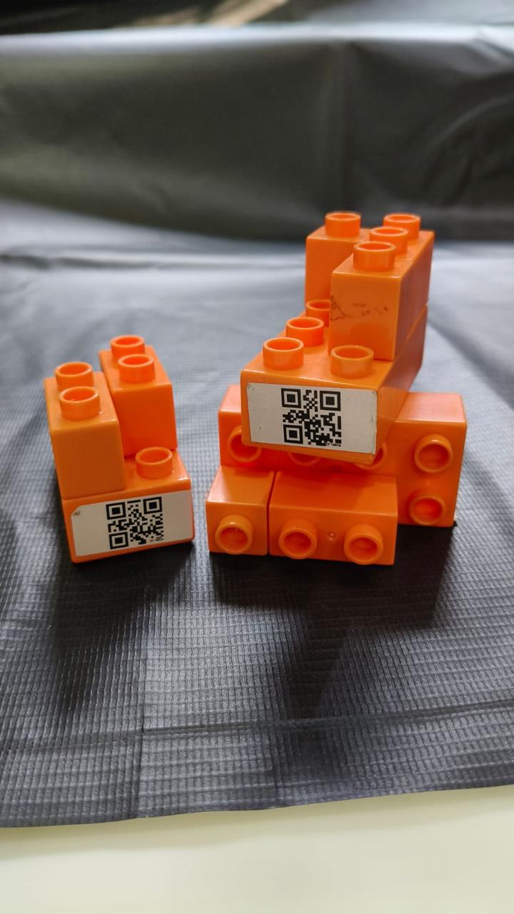 AI Camera Braille Reader with QR-coded blocks